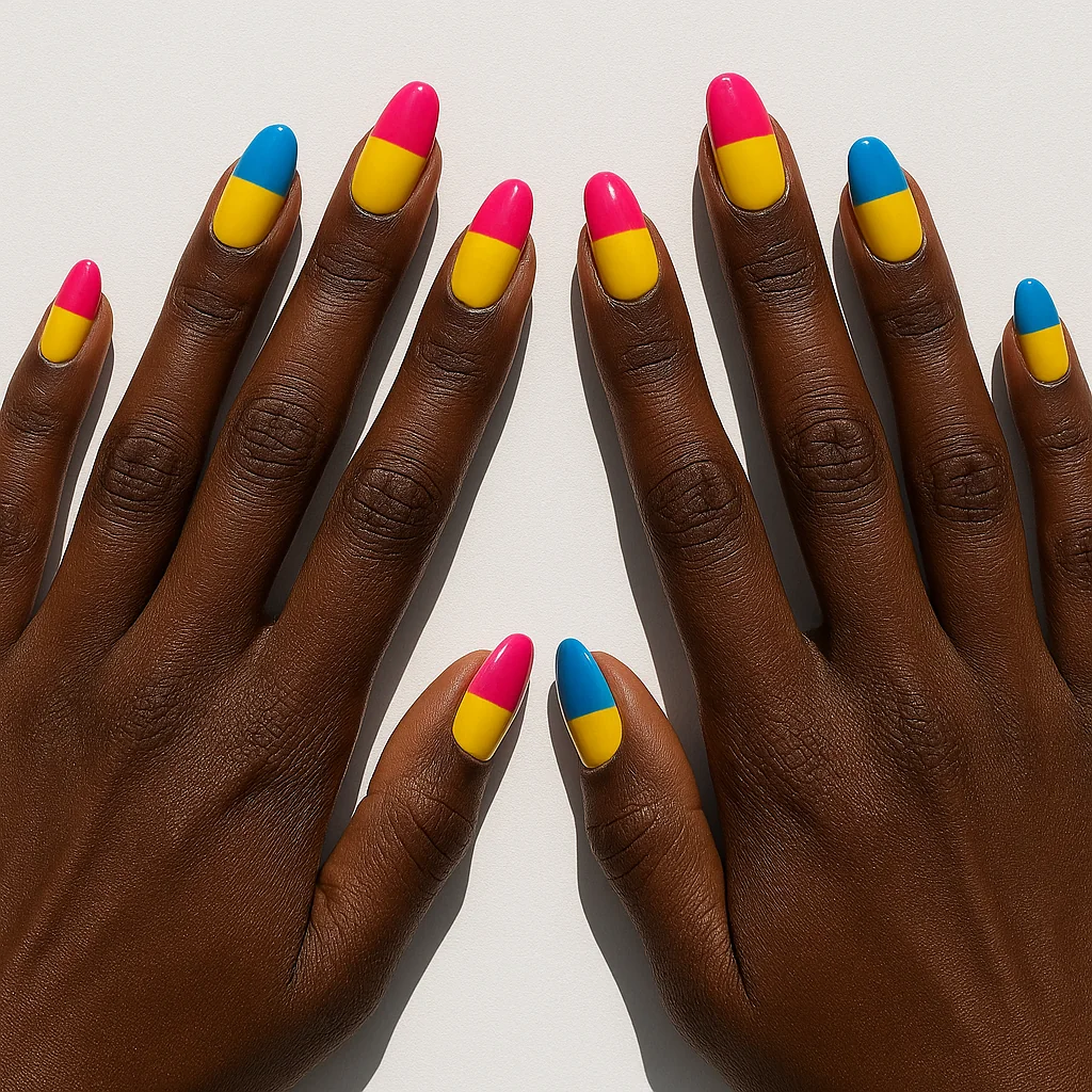 Short almond nails in pansexual Pride flag vibrant pink yellow and cyan blue on dark espresso skin in sunlight — pan pride nail 2026